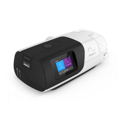 Angled profile of ResMed AirSense 11 AutoSet APAP machine showing sleek modern design